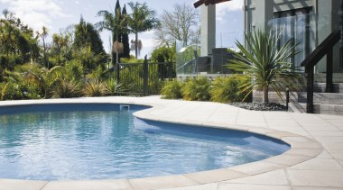View of outdoor living space designed by Ian condominium, estate, home, house, leisure, property, real estate, residential area, resort, sky, swimming pool, vacation, villa, water, white