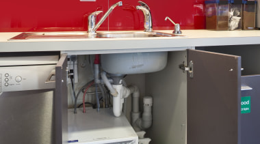 View of the staff kitchen at the BNZ countertop, kitchen, major appliance, product, shelving, red, black