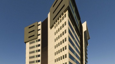 Thinc Projects managed the development of Building 4 architecture, building, commercial building, condominium, corporate headquarters, daytime, facade, headquarters, hotel, landmark, metropolis, metropolitan area, mixed use, sky, skyscraper, tower block, blue