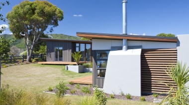 Exterior view of a home which is part architecture, cottage, estate, facade, home, house, property, real estate, villa