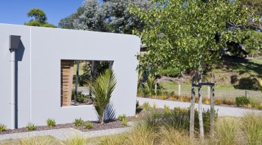 Exterior view of an energy-efficient home and gardens architecture, cottage, estate, grass, home, house, land lot, landscape, landscaping, plant, property, real estate, sky, tree, yard, brown, blue