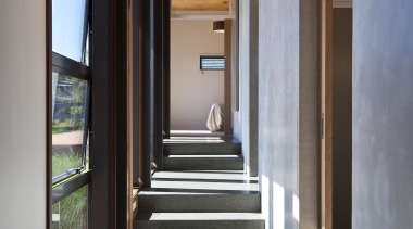 View of the a hallway which features timber architecture, ceiling, daylighting, estate, floor, flooring, home, house, interior design, real estate, window, gray