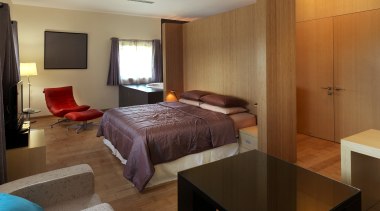 View of contemporary bedroom with wooden flooring and bedroom, interior design, real estate, room, suite, brown