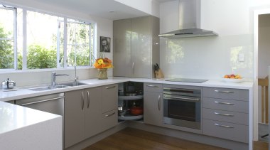 View of kitchen which features cabinetry from Hafele. cabinetry, countertop, cuisine classique, floor, home appliance, interior design, kitchen, major appliance, property, real estate, room, gray, white