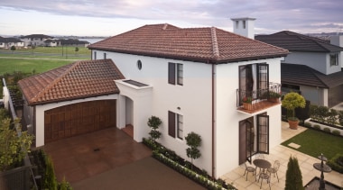 Exterior view of Eden Homes show home which building, elevation, estate, facade, home, house, mansion, outdoor structure, property, real estate, residential area, roof, suburb, villa