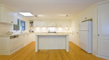 Interior view of this traditional kitchen - Interior cabinetry, ceiling, countertop, floor, flooring, hardwood, home, interior design, kitchen, laminate flooring, property, real estate, room, wood, wood flooring, gray, orange