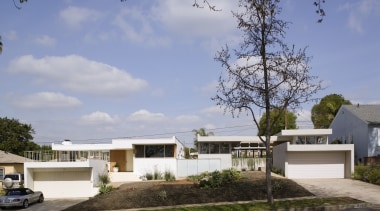 Exterior view of this contemporary home that was architecture, cottage, elevation, estate, facade, home, house, property, real estate, residential area, roof, gray