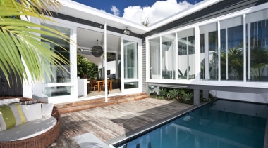 View of this modern home - View of apartment, architecture, estate, home, house, property, real estate, swimming pool, villa, window, white