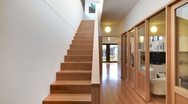 View of this contemporary remodeled lounge area - architecture, floor, flooring, handrail, hardwood, home, house, interior design, real estate, stairs, wood, wood flooring, gray