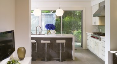 View of kitchen featuring island with CaesarStone countertops, architecture, ceiling, countertop, floor, home, house, interior design, kitchen, living room, real estate, room, table, gray