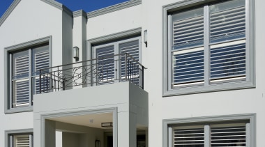 View of this contemporary home - View of architecture, building, elevation, facade, home, house, property, real estate, residential area, window, white, gray