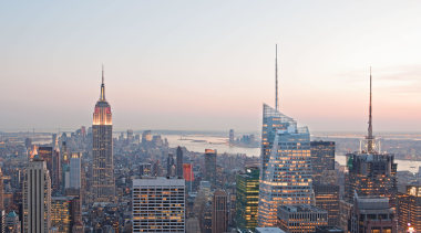 View of the Bank of America Tower in building, city, cityscape, dawn, daytime, downtown, dusk, evening, horizon, landmark, metropolis, metropolitan area, morning, sky, skyline, skyscraper, sunset, tower, tower block, urban area, white