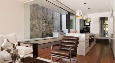 Glazed walls. Wood floors and decking. Island calacatta interior design, living room, real estate, room, gray, brown