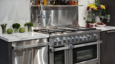 View of a kitchen which features DCS oven countertop, gas stove, home appliance, kitchen, kitchen appliance, kitchen stove, major appliance, oven, refrigerator, small appliance, gray, black