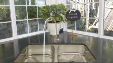 View of a kitchen which features a stainless home, interior design, property, window, gray, white