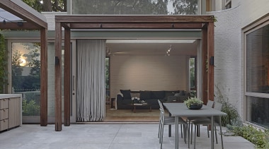 The central courtyard created by the L-shaped plan. 