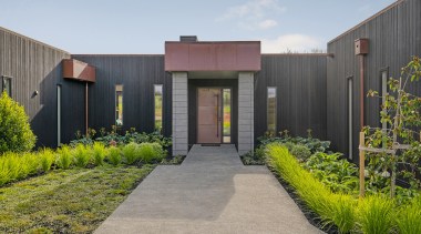 A strong entrance form with copper clad door 