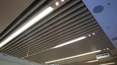 Interior view of the Poshe Centre which features architecture, ceiling, daylighting, daytime, light, lighting, line, roof, gray, black