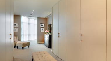 View of an apartment which features cabinetry by apartment, architecture, ceiling, door, floor, home, interior design, property, real estate, room, orange, gray