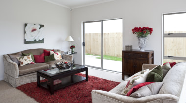 View of a living room where the interior home, interior design, living room, property, real estate, room, window, white, gray