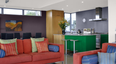 View of a kitchen which features an island home, interior design, living room, real estate, room, gray