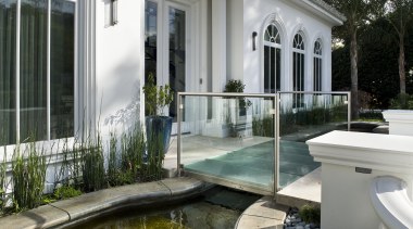 View of Tran Residence designed by Architectural Annex courtyard, estate, home, house, outdoor structure, property, real estate, swimming pool, window, gray