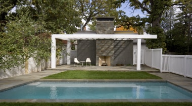 View of a multi-storey grey house with swimming architecture, backyard, cottage, estate, home, house, outdoor structure, property, real estate, swimming pool, villa, yard, brown, gray