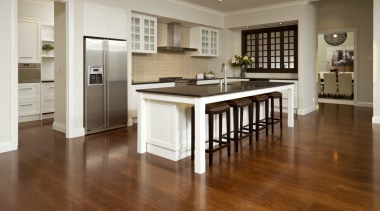 View of kitchen with wooden flooring, dark benchtops cabinetry, countertop, cuisine classique, floor, flooring, hardwood, interior design, kitchen, laminate flooring, room, wood, wood flooring, brown, gray