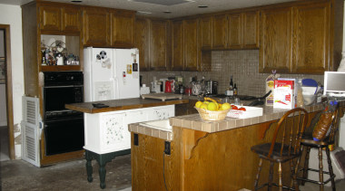 View of remodelled kitchen, with light-toned cabinetry and countertop, flooring, kitchen, room, brown