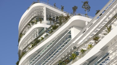 View of Solaris, an ecoskyscraper designed by Ken architecture, building, commercial building, condominium, corporate headquarters, daytime, headquarters, metropolis, metropolitan area, mixed use, real estate, residential area, sky, tower block, urban design, blue, white