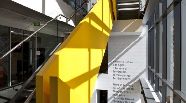 View of exterior paint by Resene at Takutai angle, architecture, building, daylighting, escalator, facade, glass, handrail, line, metropolitan area, stairs, structure, yellow, black