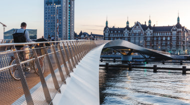 The flowing bridge connects with but also contrasts white