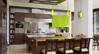 Dark-stained walnut cabinets stainless steel panels. Contemporary kitchen ceiling, countertop, dining room, interior design, kitchen, room, table, gray, brown