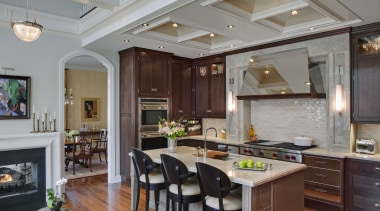 Stainless steel appliances.  Dark walnut surfaces. Custom cabinetry, ceiling, countertop, cuisine classique, estate, interior design, kitchen, living room, real estate, room, gray