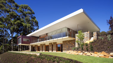 This house was designed by Tim Wright AIA architecture, elevation, estate, facade, home, house, property, real estate, residential area, villa, blue