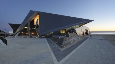 View of the exterior of the Albany Entertainment architecture, house, roof, sky, gray, blue
