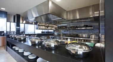 Kitchen at the Novotel Auckland Airport. - Kitchen interior design, kitchen, gray, black