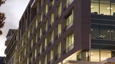 Rider Levett Bucknall Wellington worked with Mainzeal for apartment, architecture, building, city, commercial building, condominium, corporate headquarters, facade, home, hotel, house, lighting, metropolis, metropolitan area, mixed use, neighbourhood, property, real estate, residential area, tower block, window, black, brown