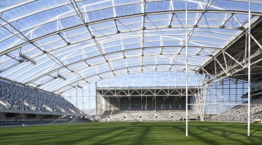 Sinclair Knight Merz (SKM) designed the roof for architecture, arena, convention center, corporate headquarters, daylighting, daytime, roof, sky, soccer specific stadium, sport venue, stadium, structure, teal