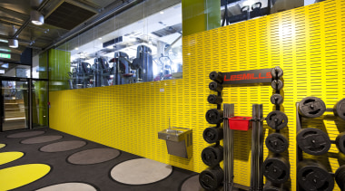 This Les Mills gym in the Britomart precinct interior design, room, structure, yellow, black