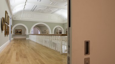 Here is a view of the architectural door architecture, ceiling, daylighting, floor, flooring, hardwood, house, interior design, laminate flooring, wall, wood, wood flooring, brown