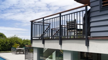 Here is a view of Sto European Plaster architecture, condominium, estate, home, house, real estate, sky, swimming pool, water, white, teal