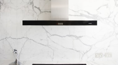 View of contemporary hood and cooktop with light black and white, floor, furniture, product design, table, wall, white