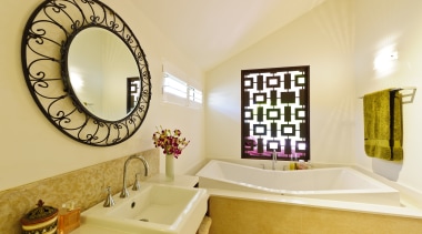 View of contemporary bathroom with round mirror and bathroom, estate, home, interior design, room, orange