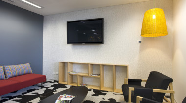 View of waiting area with tv and yellow ceiling, interior design, living room, room, wall