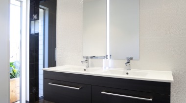 Bathroom with dark vanity and white benchtop, dark architecture, bathroom, bathroom accessory, bathroom cabinet, floor, interior design, room, sink, wall, gray, black, white