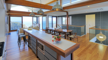 The blue-grey zinc panels on this kitchen island countertop, house, interior design, kitchen, real estate, wood, gray, brown