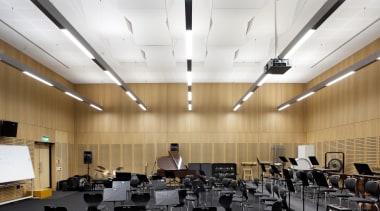 Room with wooden walls, black flooring and black architecture, auditorium, ceiling, classroom, conference hall, daylighting, interior design, white