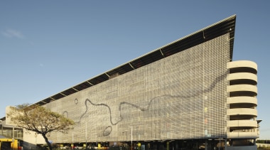 Exterior with grey wall - Exterior with grey architecture, building, commercial building, corporate headquarters, daytime, facade, headquarters, infrastructure, landmark, metropolitan area, sky, structure, teal
