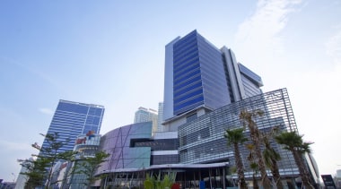 View of towers from exterior. - View of apartment, architecture, building, city, commercial building, condominium, corporate headquarters, daytime, downtown, facade, headquarters, hotel, metropolis, metropolitan area, mixed use, property, real estate, residential area, sky, skyscraper, tower block, urban area, white, teal